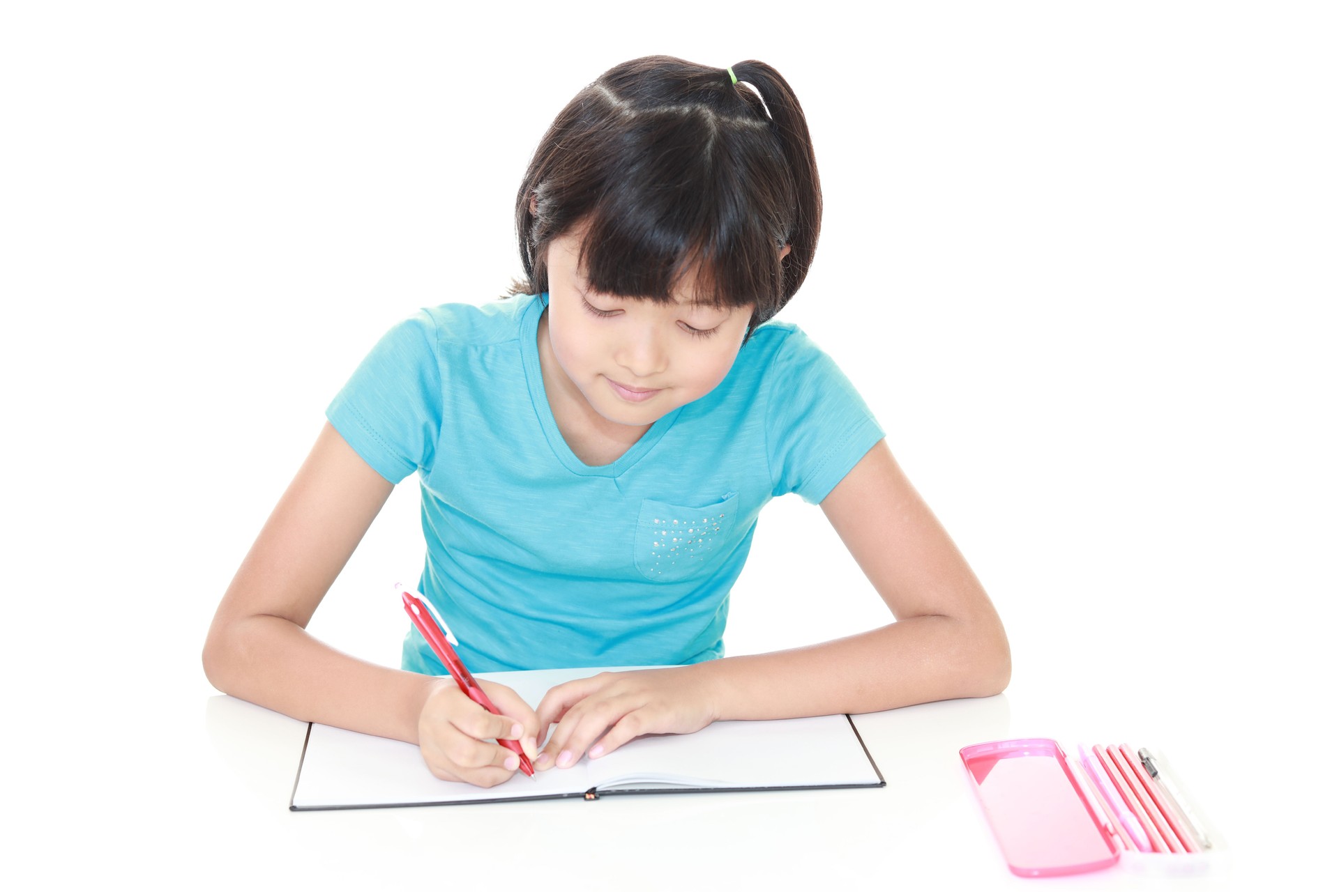 Smiling girl studying